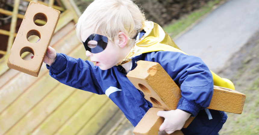 boy with bricks image